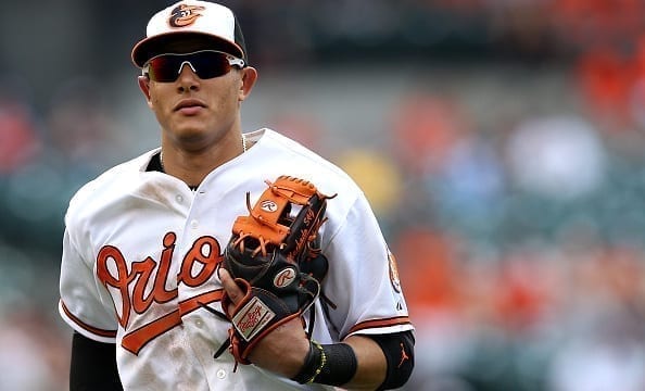 Manny Machado #13 of the Baltimore Orioles runs off the field against the New York Yankees